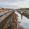 Engineers survey organised infrastructure works leading toward emerging Cambridge developments