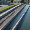 Engineers observe converging drainage channels feeding a resilient urban water network